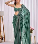 Teal beads and stones heavy work saree