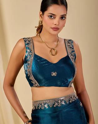 Teal ethnic motifs embroidered organza saree 4