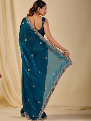 Teal ethnic motifs embroidered organza saree 5