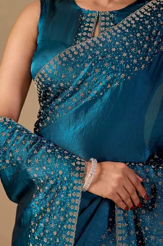 Teal embellished beads and stones organza heavy work saree