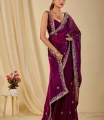 Purple ethnic motifs embroidered organza saree