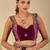 Purple ethnic motifs embroidered organza saree