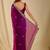 Purple ethnic motifs embroidered organza saree