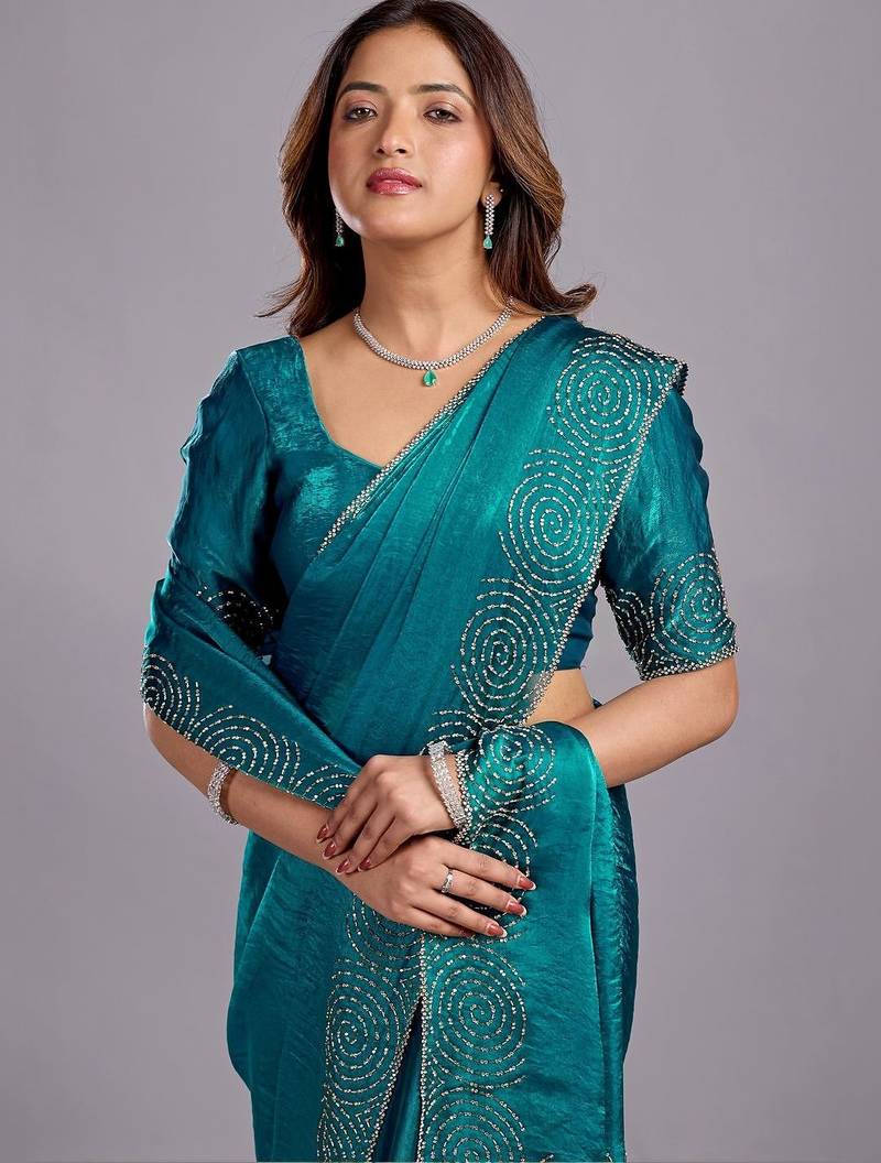 Teal embellished sequinned organza heavy work saree