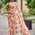 Peach floral sequinned organza saree