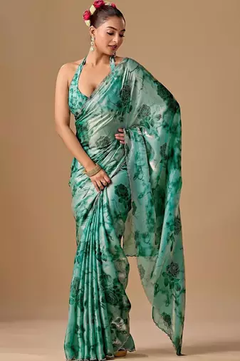 Teal floral beads and stones organza saree