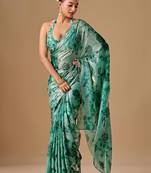 Teal floral beads and stones organza saree