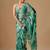 Teal floral beads and stones organza saree