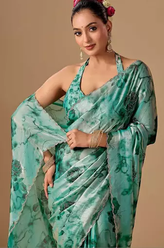 Teal floral beads and stones organza saree