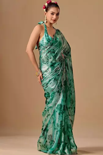 Teal floral beads and stones organza saree