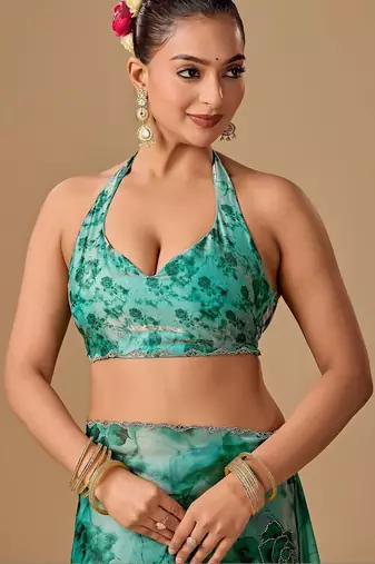 Teal floral beads and stones organza saree
