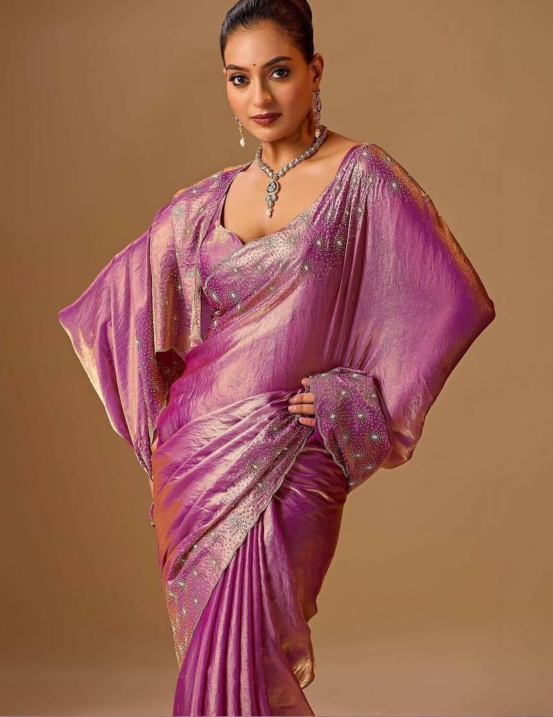 Purple embellished beads and stones organza heavy work saree