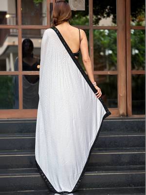 White embellished embroidered silk blend saree 4