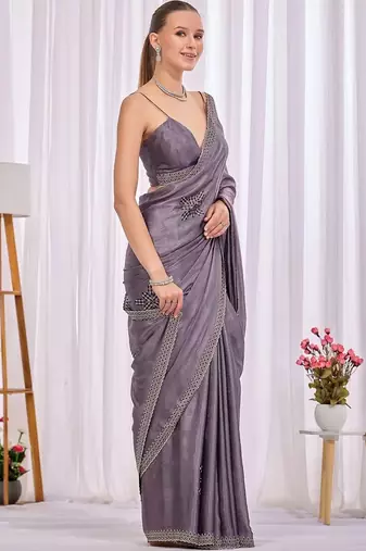 Lavender woven design beads and stones saree