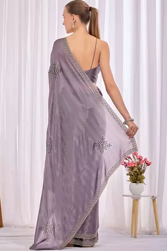 Lavender woven design beads and stones saree