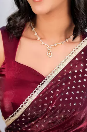 Maroon embellished sequinned tissue saree