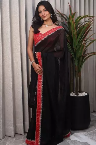 Black woven design sequinned satin saree