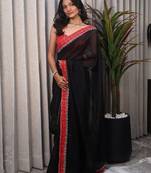Black woven design sequinned satin saree