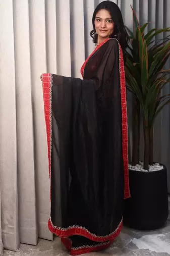 Black woven design sequinned satin saree