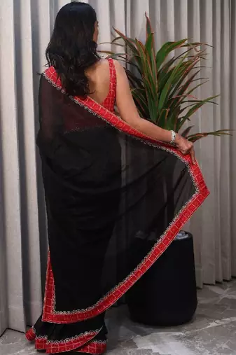 Black woven design sequinned satin saree