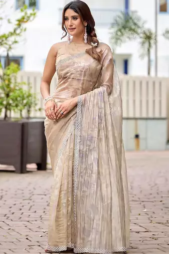 Beige floral beads and stones tissue saree