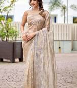 Beige floral beads and stones tissue saree