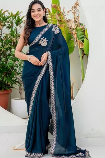Teal embroidered silk blend saree