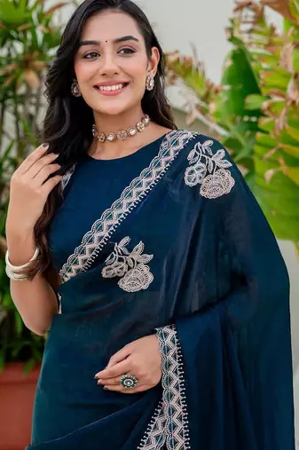 Teal embroidered silk blend saree