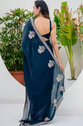 Teal embroidered silk blend saree