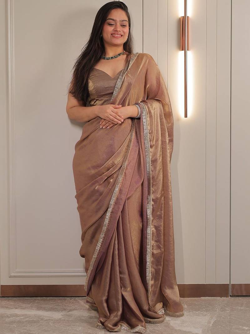 Gold sequinned satin saree