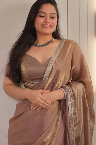 Gold sequinned satin saree