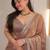 Gold sequinned satin saree