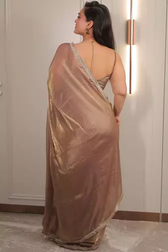 Gold sequinned satin saree