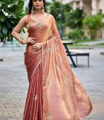 Peach ethnic motifs embroidered organza saree