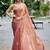 Peach ethnic motifs embroidered organza saree