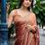 Peach ethnic motifs embroidered organza saree