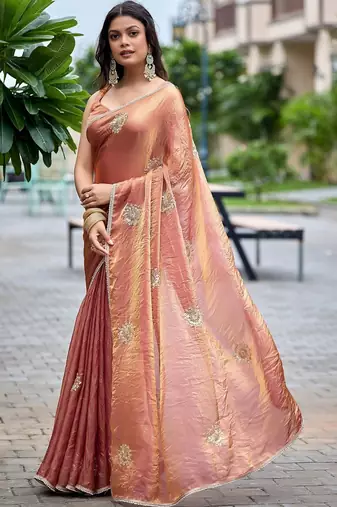 Peach ethnic motifs embroidered organza saree