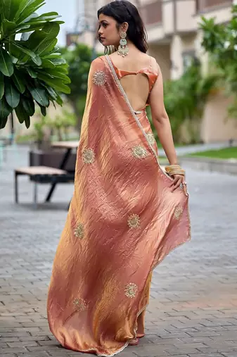 Peach ethnic motifs embroidered organza saree