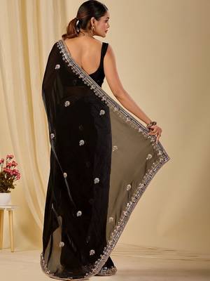 Black ethnic motifs embroidered organza saree 5