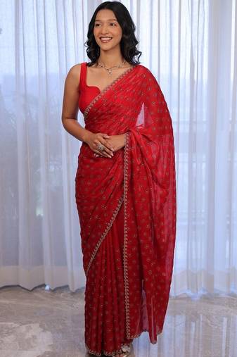Red sequinned silk cotton saree