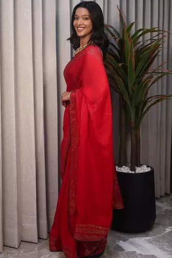 Red embellished sequinned poly chiffon heavy work saree
