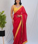 Red sequinned satin saree