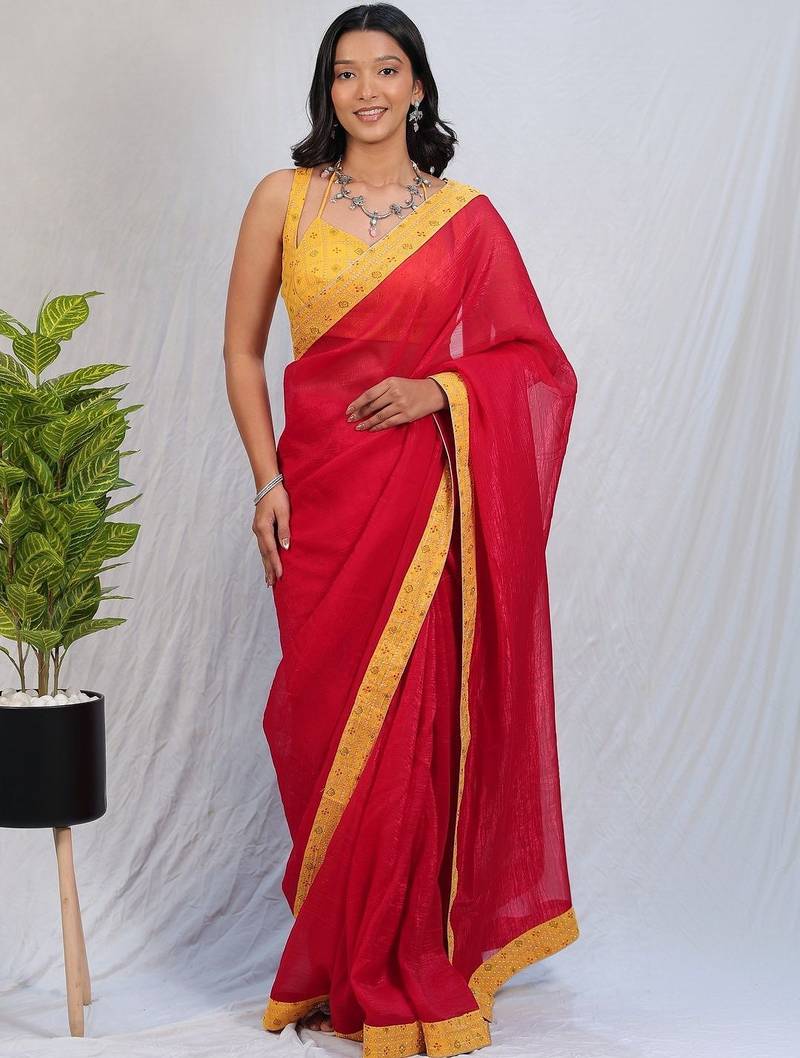 Red sequinned satin saree