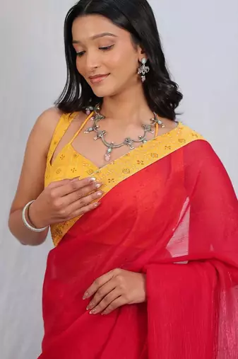 Red sequinned satin saree