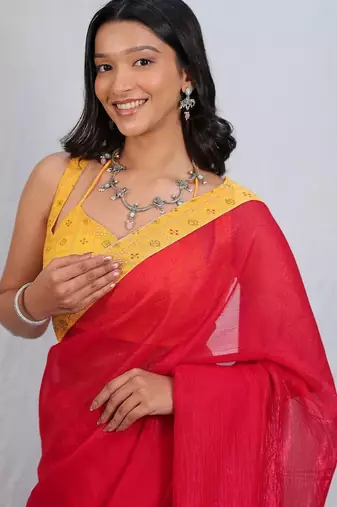 Red sequinned satin saree