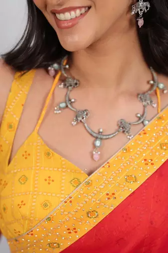 Red sequinned satin saree