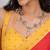 Red sequinned satin saree