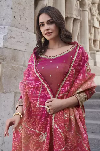 Magenta shimmer readymade suit with embroidery work