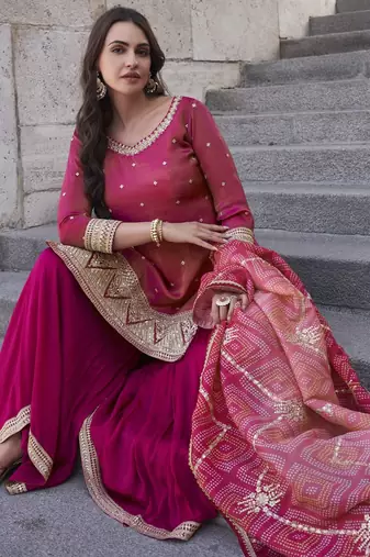 Magenta shimmer readymade suit with embroidery work