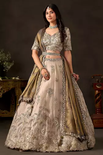 Graceful Cream Embroidered Silk Bridesmaid Wear Lehenga Choli